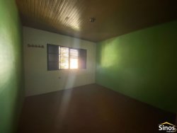 Terreno com construção no bairro Vila Nova 