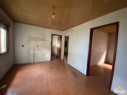 Terreno com construção no bairro Vila Nova 