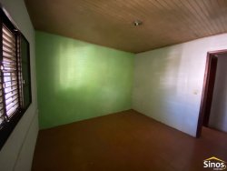 Terreno com construção no bairro Vila Nova 
