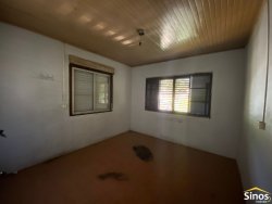 Terreno com construção no bairro Vila Nova 