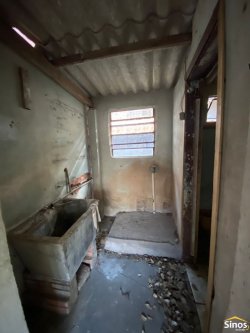 Terreno com construção no bairro Vila Nova 