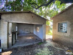 Terreno com construção no bairro Vila Nova 