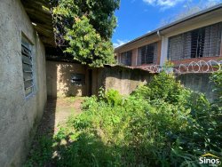 Terreno com construção no bairro Vila Nova 