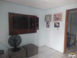 Terreno com 02 casas no bairro Lomba Grande 