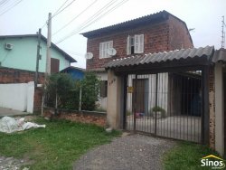 Terreno com 02 casas no bairro Lomba Grande 