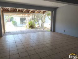 Terreno com 02 casas no bairro Vila Nova 