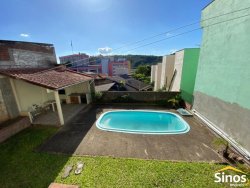 Casa com 03 dormitórios no bairro Vila Nova 