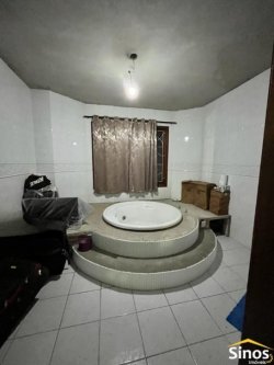 Casa com 03 dormitórios no bairro Vila Nova 