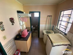 Casa com 05 dormitórios no bairro Vila Nova 