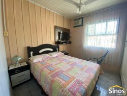 Casa com 05 dormitórios no bairro Vila Nova 