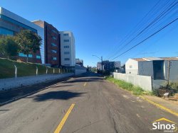 Terreno com construção no bairro Vila Nova 