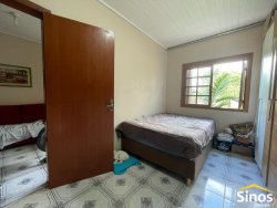 Casa com 02 dormitórios no bairro Jardim América 