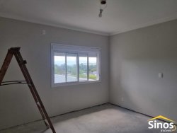 Casa com 03 dormitórios no condomínio Moradas da Lomba 