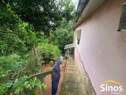 Terreno com construção no bairro Rondônia 