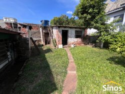 Terreno com 02 casas no bairro Guarani 