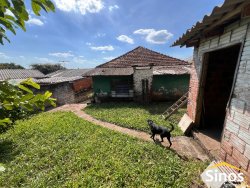 Terreno com 02 casas no bairro Guarani 