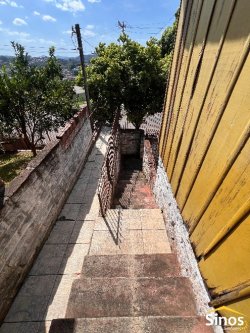Terreno com 02 casas no bairro Guarani 