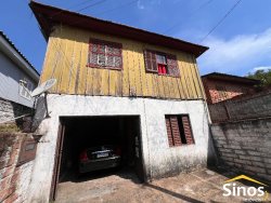 Terreno com 02 casas no bairro Guarani 