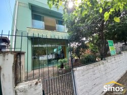 Prédio comercial com casa no bairro Guarani 