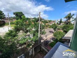Prédio comercial com casa no bairro Guarani 