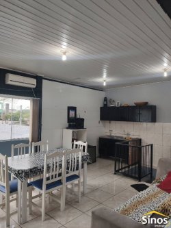 Terreno com 02 casas no bairro Canudos 