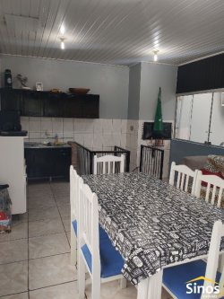 Terreno com 02 casas no bairro Canudos 