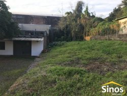 Terreno com construção no bairro Rondônia 