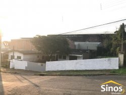 Terreno com construção no bairro Rondônia 