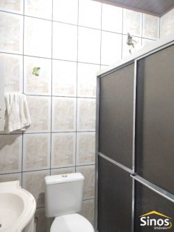 Terreno com 02 casas no bairro Lomba Grande 