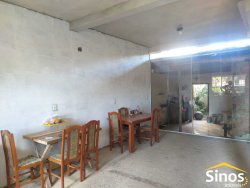 Terreno com 02 casas no bairro Lomba Grande 