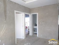 Terreno com 02 casas no bairro Lomba Grande 