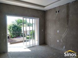 Terreno com 02 casas no bairro Lomba Grande 