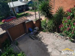 Terreno com 02 casas no bairro Lomba Grande 