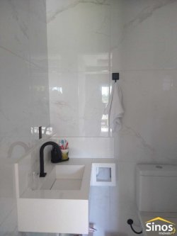 Terreno com 02 casas no bairro Lomba Grande 