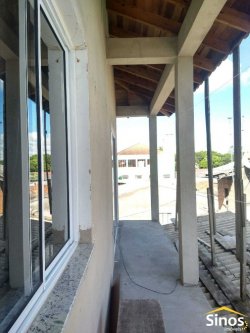 Terreno com 02 casas no bairro Lomba Grande 