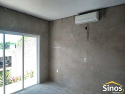 Terreno com 02 casas no bairro Lomba Grande 