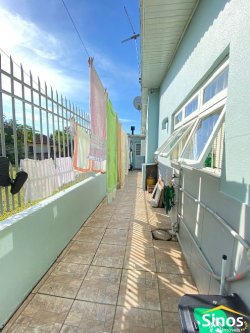 Terreno com 02 casas no bairro 25 de Julho 