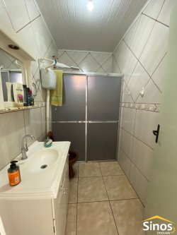 Terreno com 02 casas no bairro 25 de Julho 
