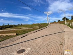 Terreno de esquina com 208,16m² no condomínio Moradas da Lomba 