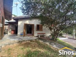 Terreno com 02 casas e sala comercial no bairro Guarani 