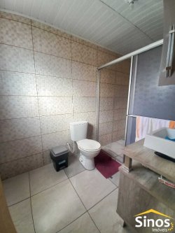 Terreno com 02 casas e sala comercial no bairro Guarani 