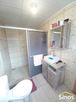Terreno com 02 casas e sala comercial no bairro Guarani 