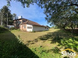 Área de terra com pavilhão em Lomba Grande 