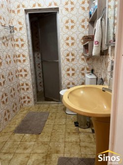 Casa com 03 dormitórios no Centro de Lomba Grande 