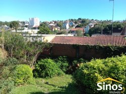 Terreno com prédio comercial no bairro Ideal 