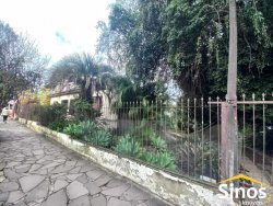 Terreno com construção no bairro Jardim Mauá 