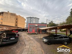 Terreno de esquina com construção 120m² no bairro Boa Vista 