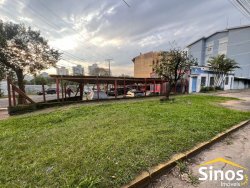 Terreno de esquina com construção 120m² no bairro Boa Vista 