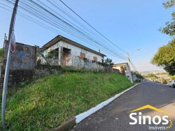 Terreno de esquina com sobrado no bairro Canudos 