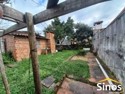 Terreno com construções no bairro Jardim Mauá 
